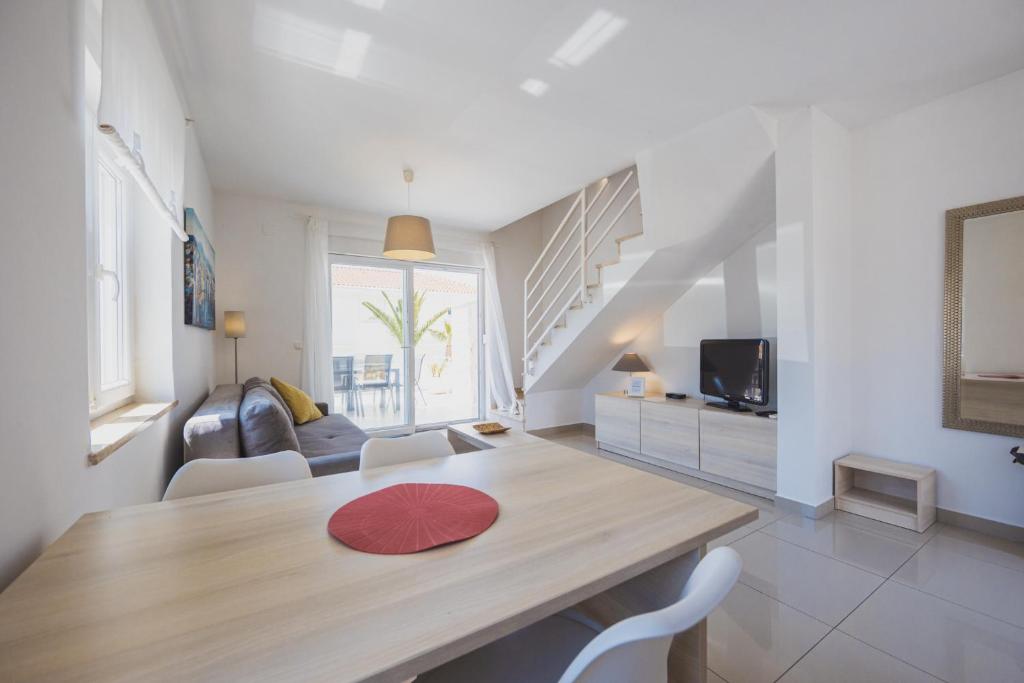Dining area with staircase to the upper floor