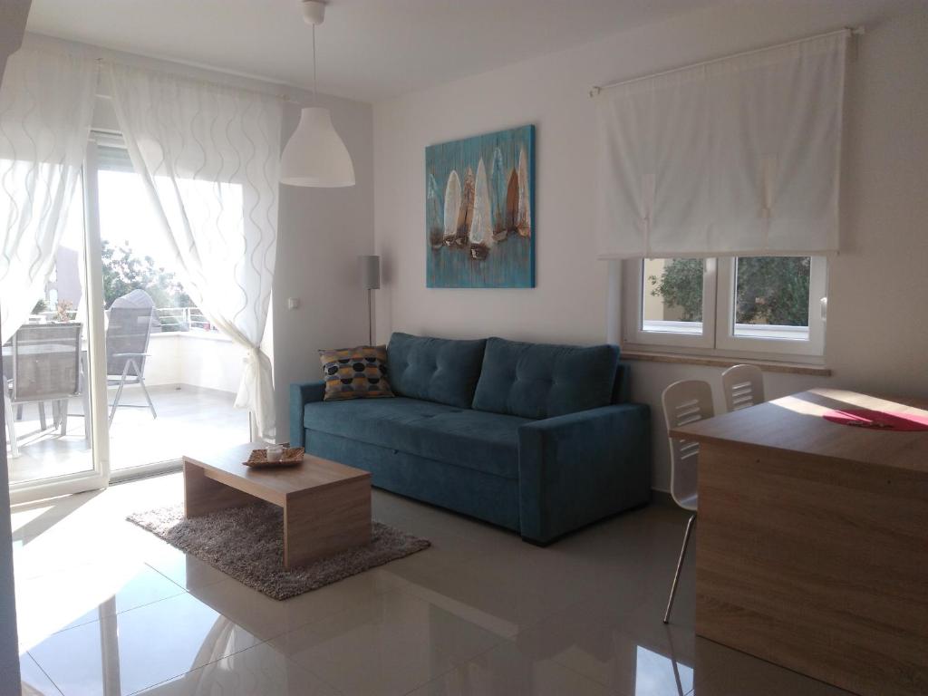 Living room with sofa and balcony access